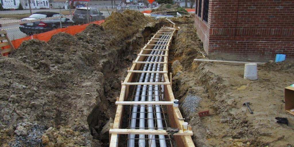 Multi-duct conduit bank placed in an open trench